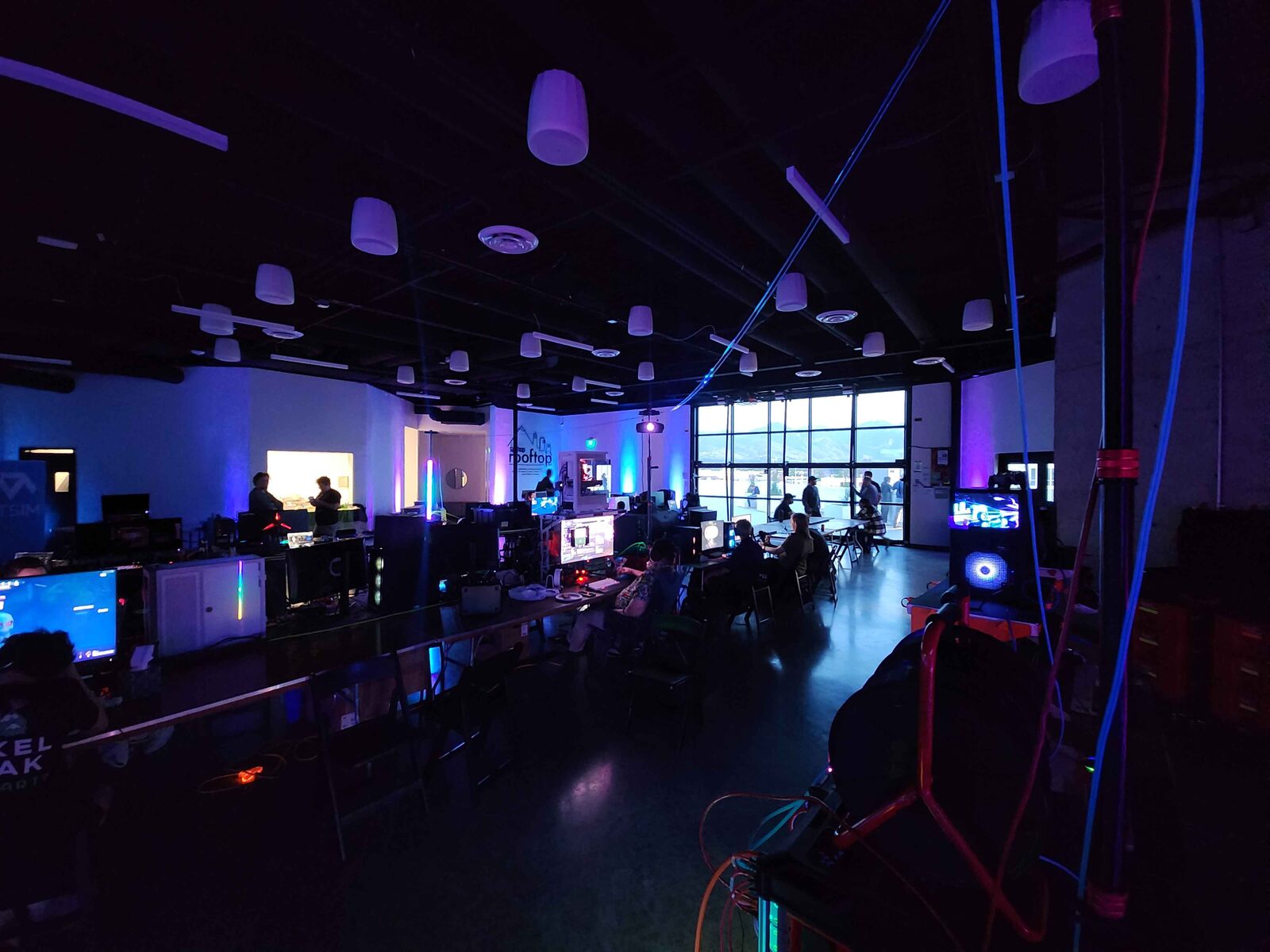 Rigs glowing on the Spy Hop rooftop at Pixel Peak LAN 2026